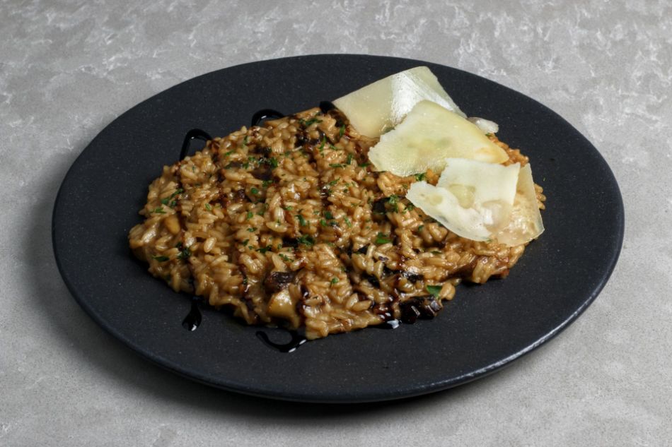 Risotto with wild porcini mushrooms from Trentino: a journey through the autumnal flavours of the Alps